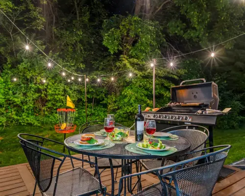 Step out of the Cozy Cove (next to the kitchen) area to enjoy the backyard with yummy BBQ and fun-filled games.